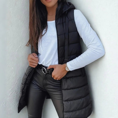 Frieda | Lange mouwloze dames bodywarmer met capuchon