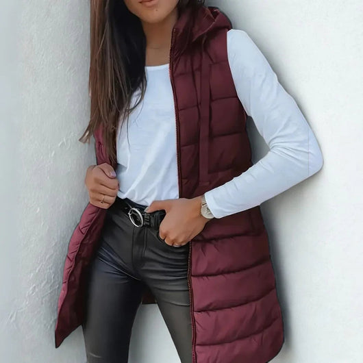 Frieda | Lange mouwloze dames bodywarmer met capuchon