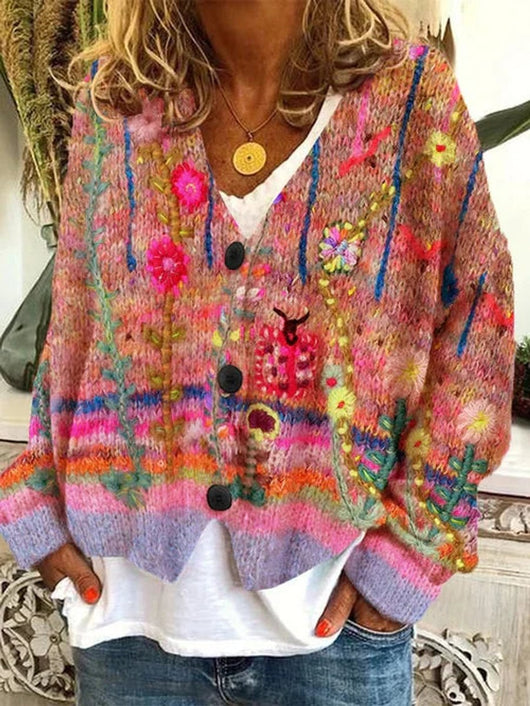 Marie | Kleurrijk dames gebreid vest met retro bloemendessin en knoopsluiting