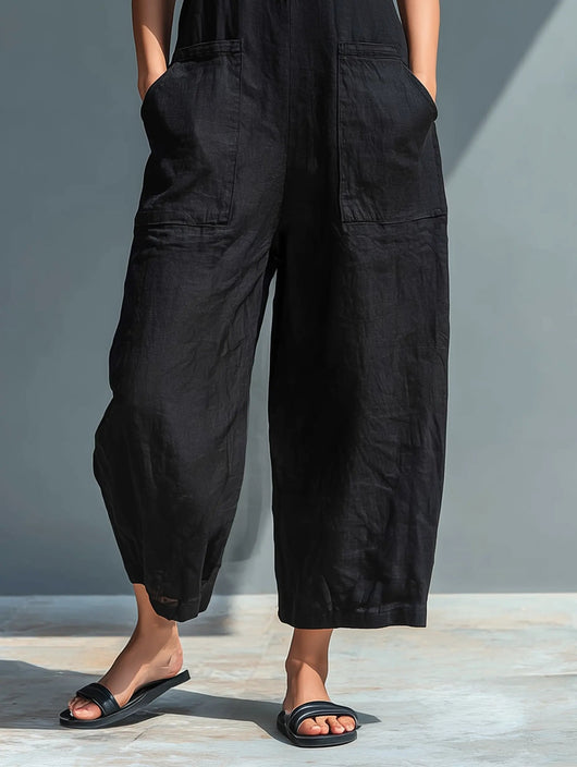 Annika | Mouwloze dames linnen jumpsuit met knoopsluiting en opstaande kraag