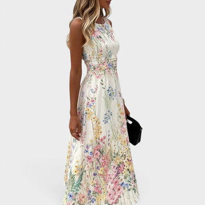 Charlotte | Mouwloze getailleerde dames midi-jurk met bloemendessin in A-lijn