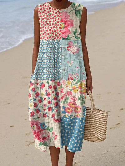 Annika | Mouwloze dames patchwork midi-jurk met bloemen- en stippenmotief