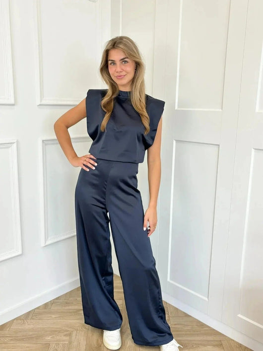 Clara | Elegante mouwloze dames satijnen jumpsuit met wijde pijpen