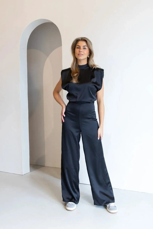 Clara | Elegante mouwloze dames satijnen jumpsuit met wijde pijpen
