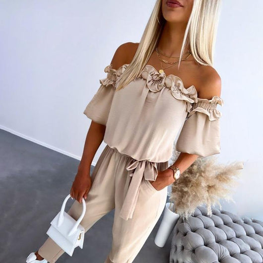 Amelie | Dames off-shoulder jumpsuit met ruches en strikband bij de taille