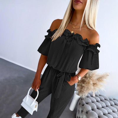 Amelie | Dames off-shoulder jumpsuit met ruches en strikband bij de taille