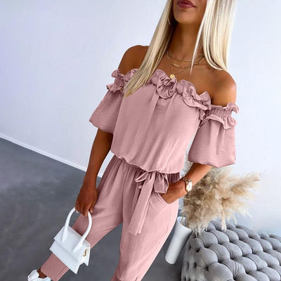 Amelie | Dames off-shoulder jumpsuit met ruches en strikband bij de taille
