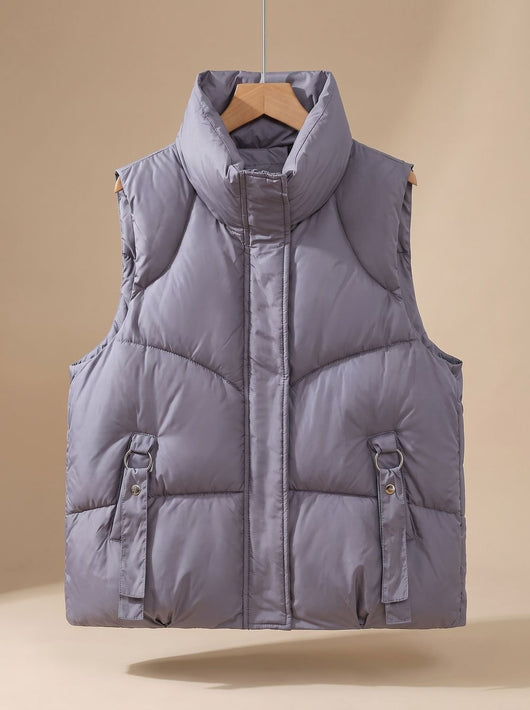 Nora | Gewatteerde dames bodywarmer met hoge opstaande kraag en sierbandjes