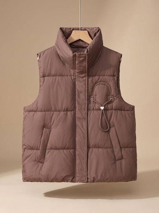 Leonie | Gewatteerde dames bodywarmer met opstaande kraag en koord-hartdetail