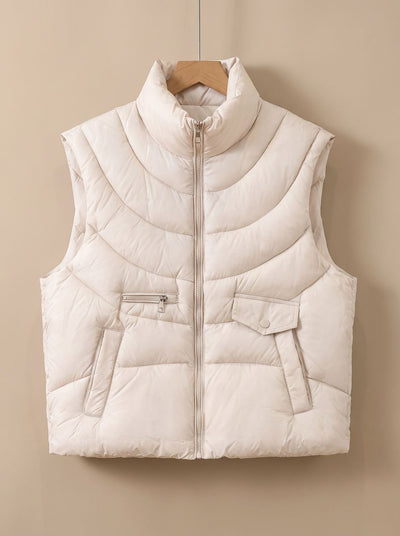 Greta | Gewatteerde dames bodywarmer met opstaande kraag en multifunctionele zakken