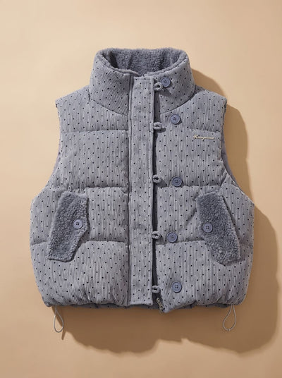 Marie | Gewatteerde dames bodywarmer met teddyvoering en stippen
