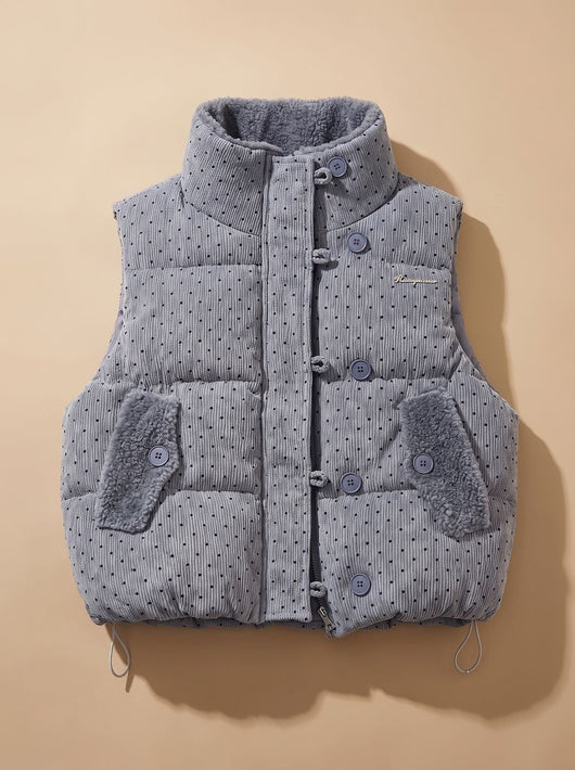 Marie | Gewatteerde dames bodywarmer met teddyvoering en stippen