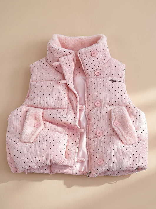Marie | Gewatteerde dames bodywarmer met teddyvoering en stippen