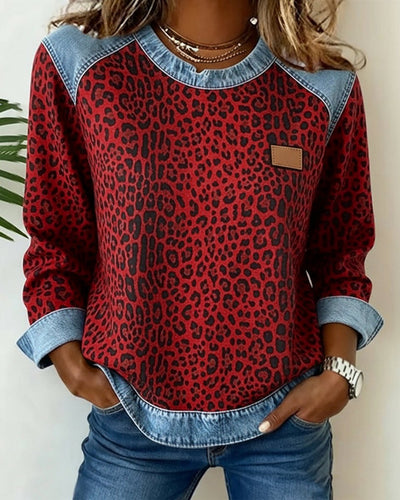 Charlotte | Dames sweater met luipaardprint en denim patchworkdetails