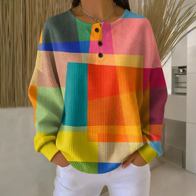 Lena | Kleurrijke dames wafelbreisweater met ronde hals en knoopsluiting