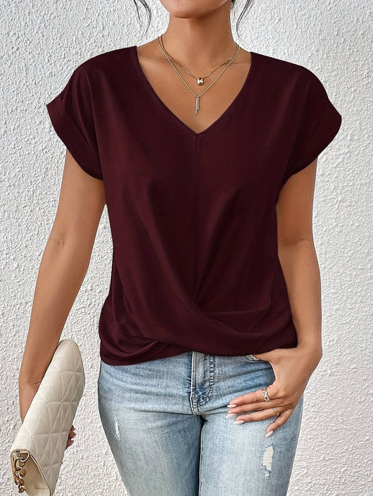 Sophie | Dames shirt met V-hals, korte mouwen en twistdetail