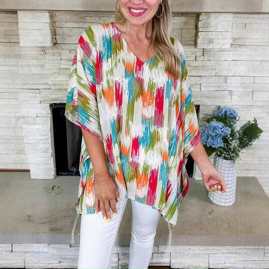 Clara | Wijde oversized dames tuniek met V-hals en kleurrijk verloopdessin