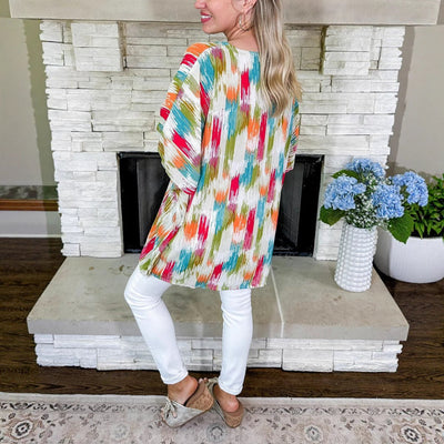 Clara | Wijde oversized dames tuniek met V-hals en kleurrijk verloopdessin