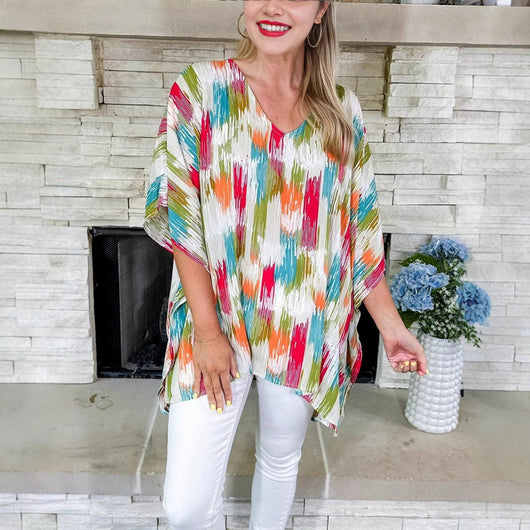Clara | Wijde oversized dames tuniek met V-hals en kleurrijk verloopdessin