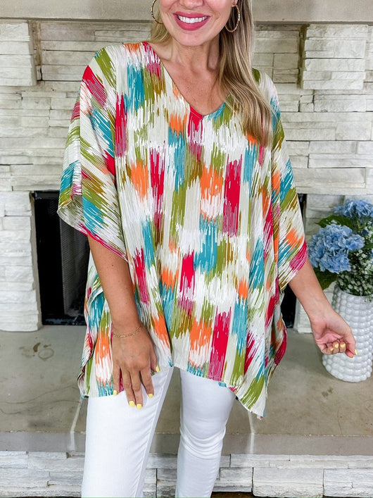 Clara | Wijde oversized dames tuniek met V-hals en kleurrijk verloopdessin