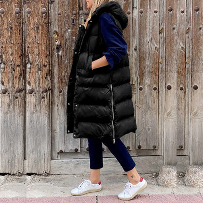 Lena | Lange mouwloze gewatteerde dames bodywarmer met capuchon