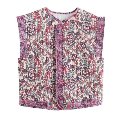 Frieda | Gewatteerde dames bodywarmer met bloemenprint en zijzakken