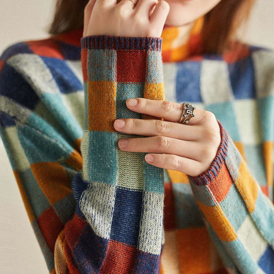 Andrea | Dames gebreide trui met colorblock en ruitdessin