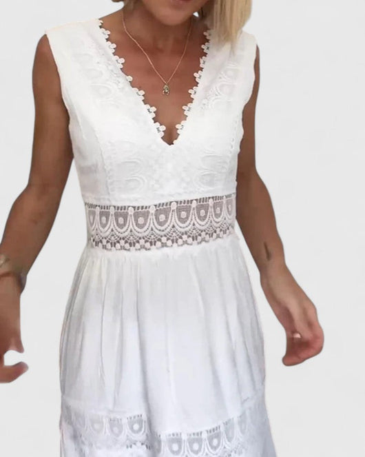 Emilia | Mouwloze dames midijurk met V-hals en kant