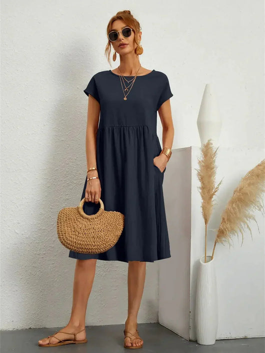 Seraphine | Midi-jurk met smokdetails en zakken – casual zomerjurk