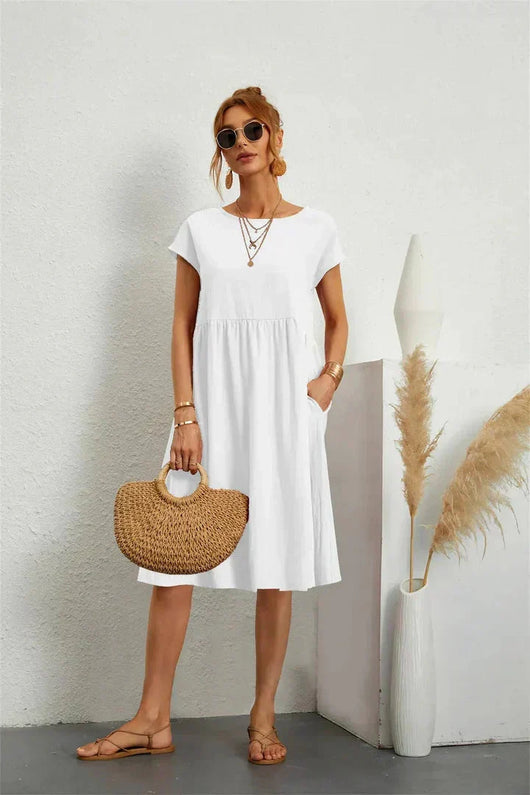 Seraphine | Midi-jurk met smokdetails en zakken – casual zomerjurk