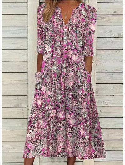 Serafina | Bloemen maxijurk met knoopsluiting – elegante jurk