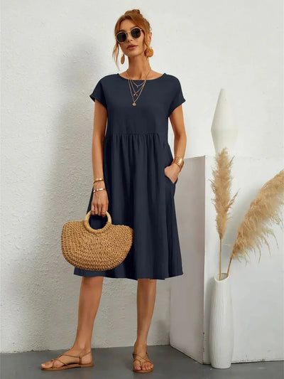 Seraphine | Midi-jurk met smokdetails en zakken – casual zomerjurk