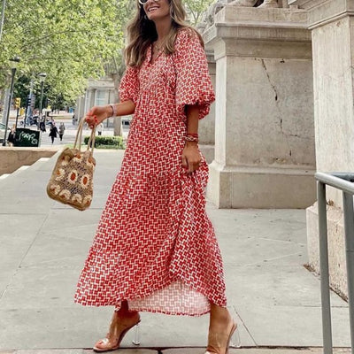 Flora | Boho maxijurk met print, pofmouwen en V-hals
