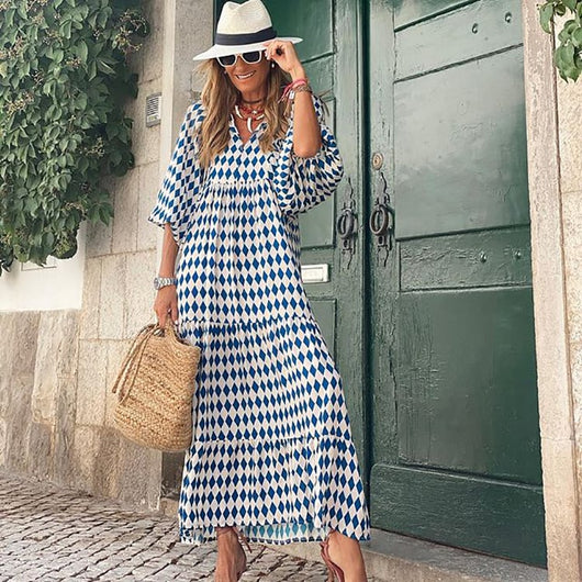 Flora | Boho maxijurk met print, pofmouwen en V-hals