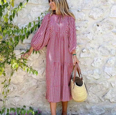 Flora | Boho maxijurk met print, pofmouwen en V-hals