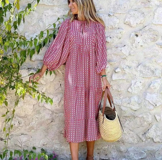 Flora | Boho maxijurk met print, pofmouwen en V-hals