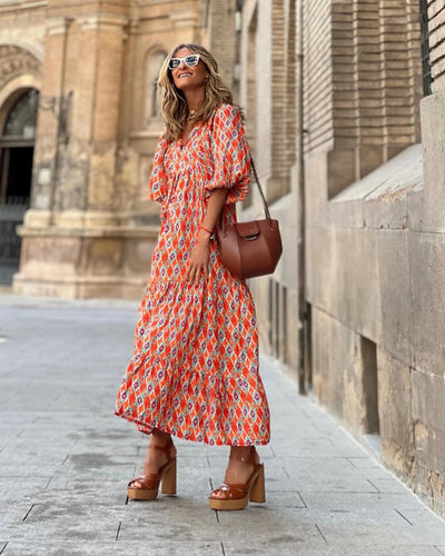 Flora | Boho maxijurk met print, pofmouwen en V-hals