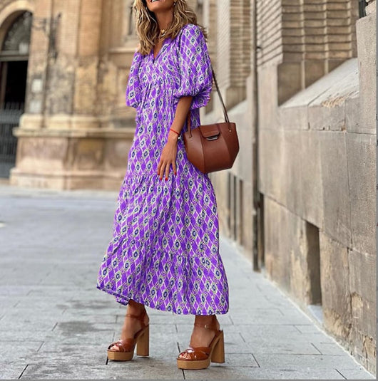 Flora | Boho maxijurk met print, pofmouwen en V-hals
