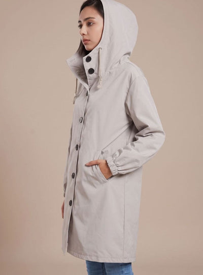 Greta | Waterafstotende lange dames outdoormantel met capuchon