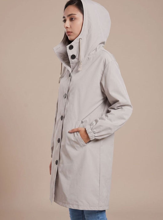 Greta | Waterafstotende lange dames outdoormantel met capuchon