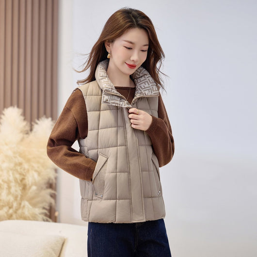 Sophie | Gewatteerde mouwloze dames bodywarmer met opstaande kraag en rits