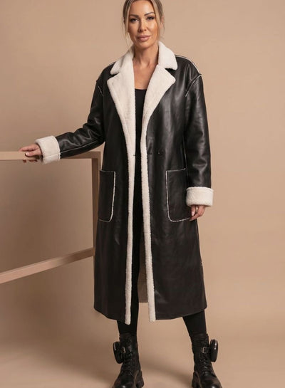 Clara | Lange dames wintermantel van imitatieleer met fleece