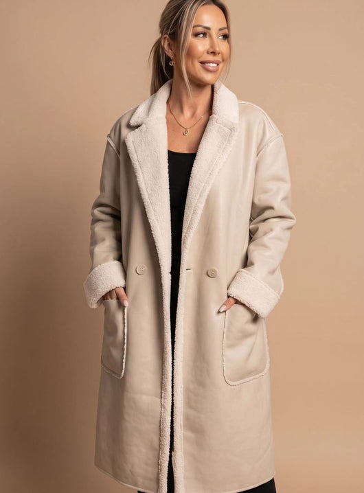 Clara | Lange dames wintermantel van imitatieleer met fleece