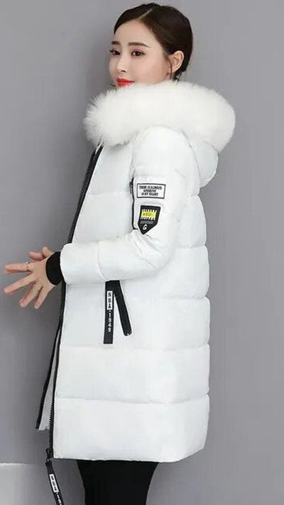Clara | Lange gewatteerde dames winterparka met bontkraag en capuchon